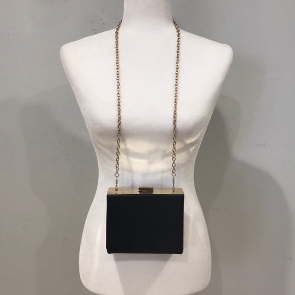 black and gold side bag